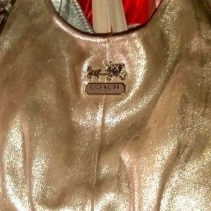 Gold coach handbag